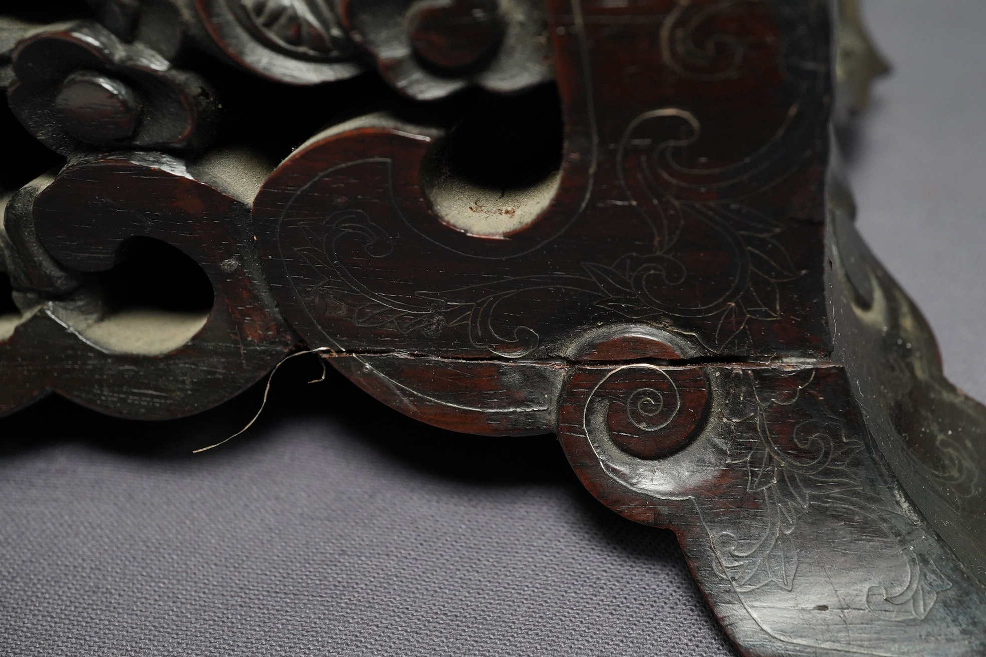 An important pair of Chinese carved zitan and silver wire inlaid ‘cloud and dragon’ curio cabinets and stands, duobaoge, probably Imperial, late Qing dynasty